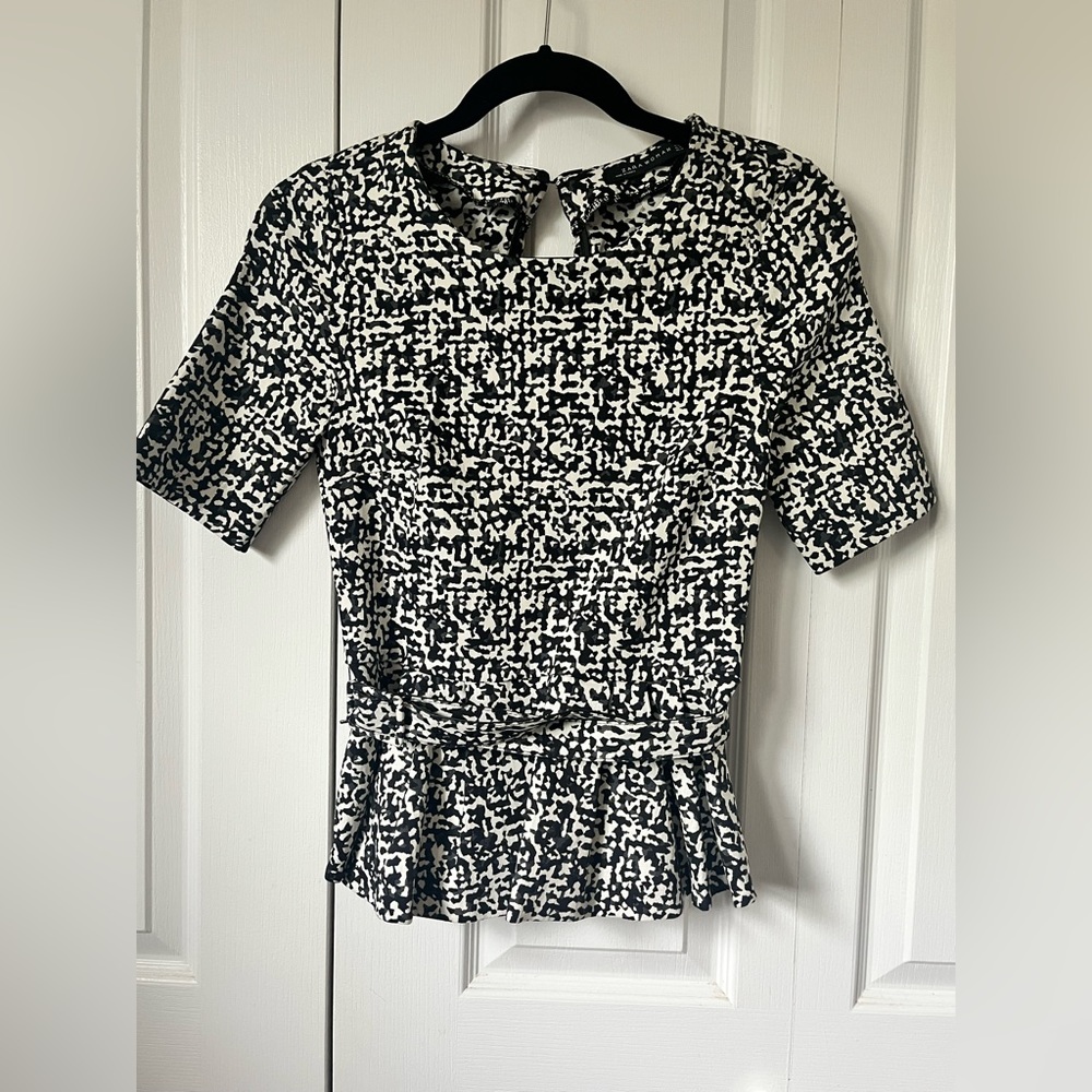 Zara Black + White Peplum Top. Peplum is back for Fall 2023.